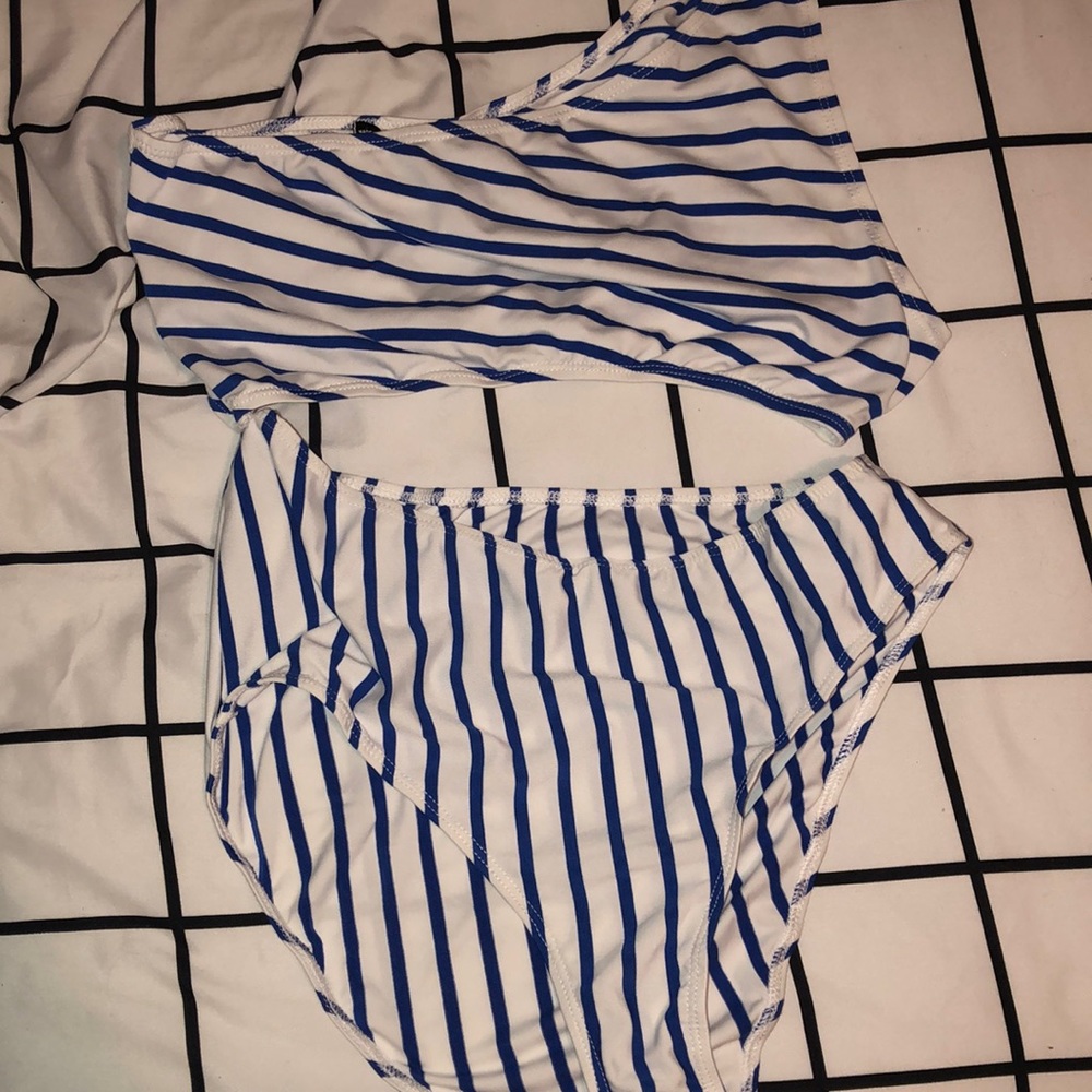 blue and white striped body suit